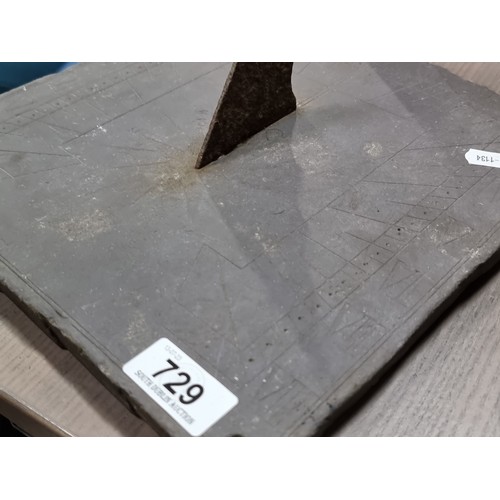 729 - An early 19th century sundial on slate. A finely crafted example with roman numeral dial and central... 