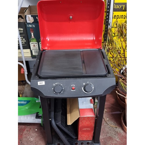 801 - A fantastic outdoor electric bbq grill with striking red lid and temperature gauge to front, griddle... 