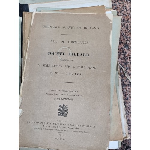 826 - A vintage ledger containing a large number of antique Ordnance Survey published list of townlands fo... 