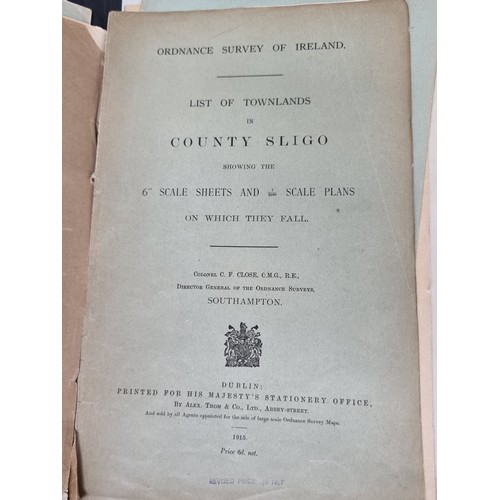 826 - A vintage ledger containing a large number of antique Ordnance Survey published list of townlands fo... 