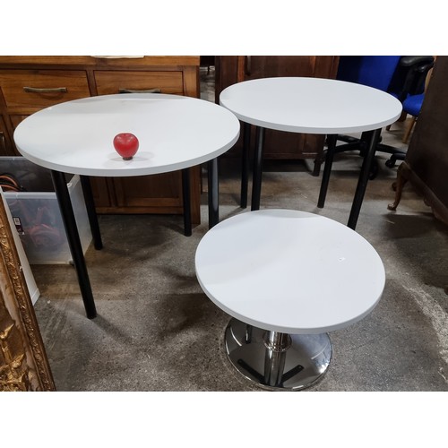 703 - Three round tables including a particularly nice Italian made side table with white top held on a tu... 