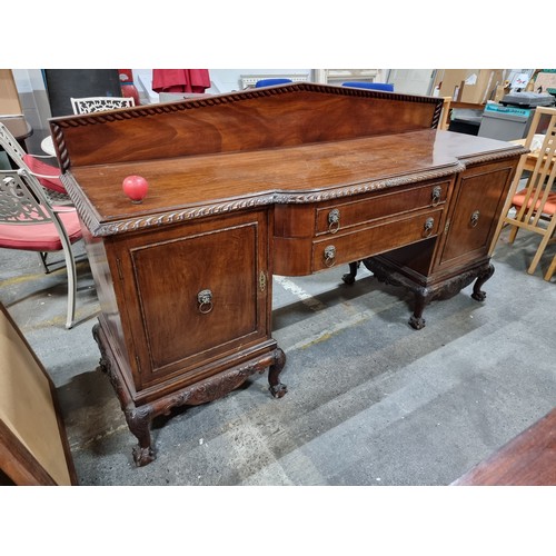 685 - Star Lot : A very large and impressive antique Georgian style sideboard with pediment style gallery ... 