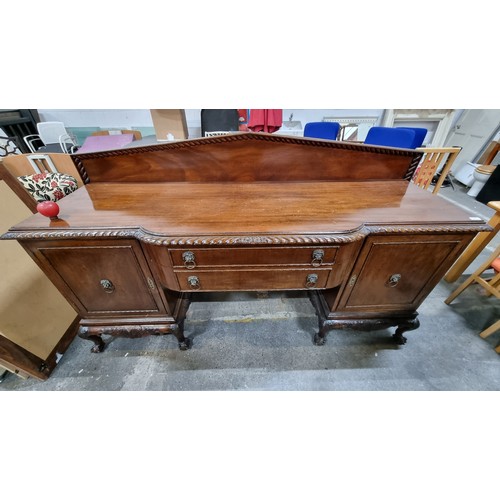 685 - Star Lot : A very large and impressive antique Georgian style sideboard with pediment style gallery ... 