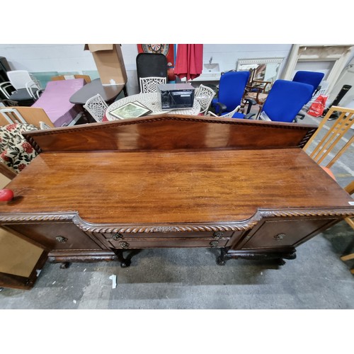 685 - Star Lot : A very large and impressive antique Georgian style sideboard with pediment style gallery ... 