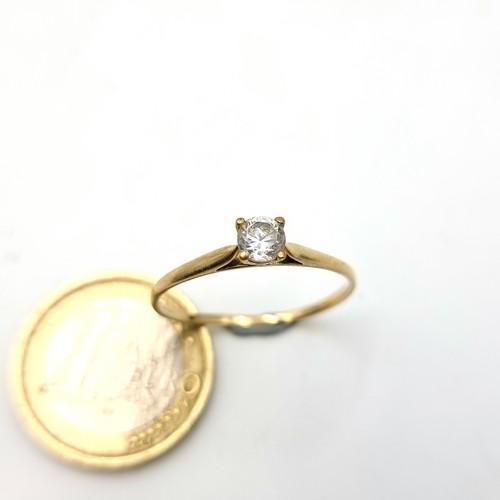 5 - A fine example of a 9 carat gold sparkling gem stone solitaire ring. Stamped 375. Weight: 1.28 grams... 