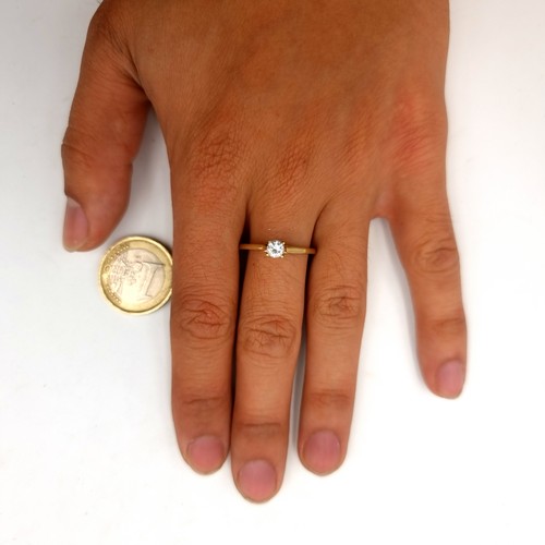 5 - A fine example of a 9 carat gold sparkling gem stone solitaire ring. Stamped 375. Weight: 1.28 grams... 