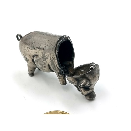 48 - An excellent example of a silver pig figure Vesta case, featuring a hinged lid and striker to unders... 