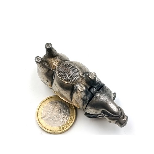 48 - An excellent example of a silver pig figure Vesta case, featuring a hinged lid and striker to unders... 