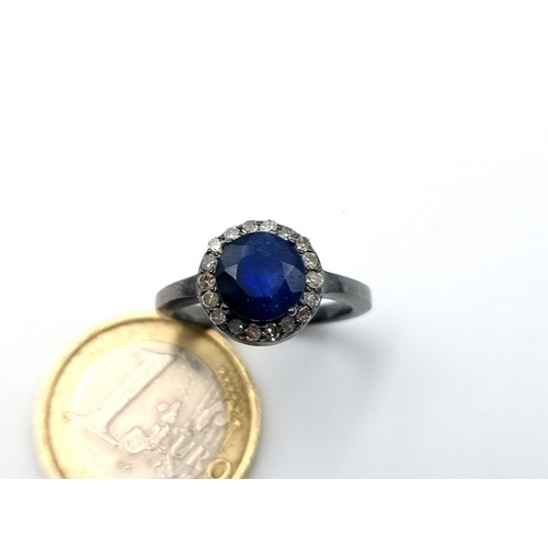 60 - Star Lot : A mesmerising natural Blue Sapphire and Diamond ring, featuring a cushion cut centre ston... 