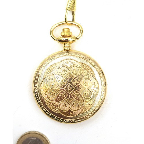 505 - A nicely embossed gilt toned quartz pocket watch, set with machine cut interior, a Grecian rider and... 