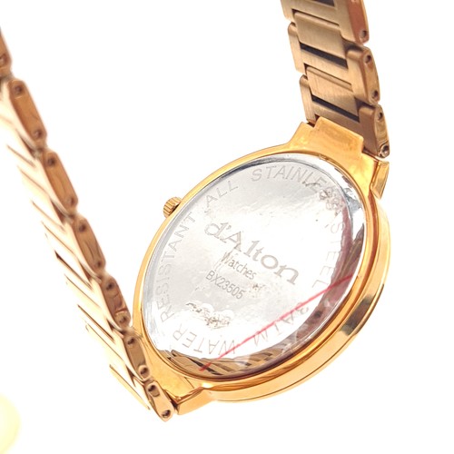 553 - A D'Alton of Paris rose gold wrist watch and bracelet, set with baton dial and sweep second hand. En... 