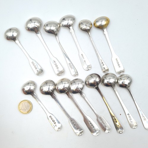 888 - Star lot :An excellent and large collection of 13 sterling silver cruet spoons, set with fiddle fina... 