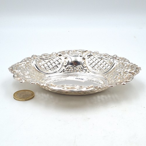 887 - A beautiful example of an Irish silver bonbon dish, featuring a fabulously profuse intricate lattice... 