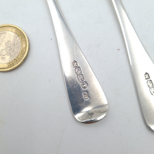 896 - A matching set of six heavy sterling silver teaspoons. Each etched with a dragon and flower to finia... 