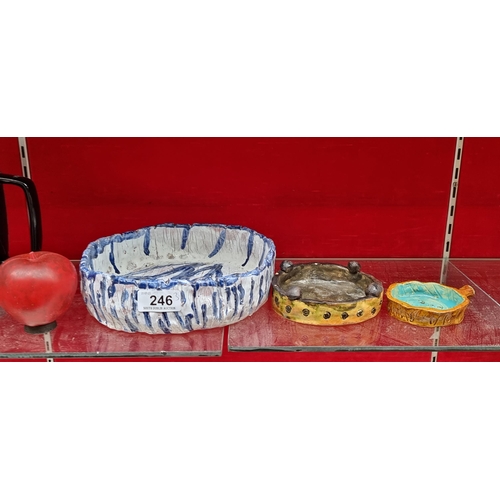 246 - Three arts pottery ceramic items including a large terracotta centerpiece bowl in blue and white, al... 