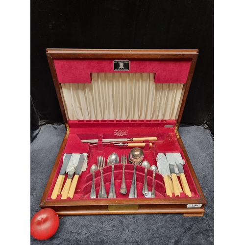 254 - An elegant vintage canteen by K.B. Quality Sheffield comprising of knives, forks, teaspoons, tablesp... 