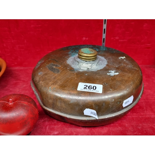 260 - A vintage copper water bottle bed warmer with great patina throughout and a screw-on lid.