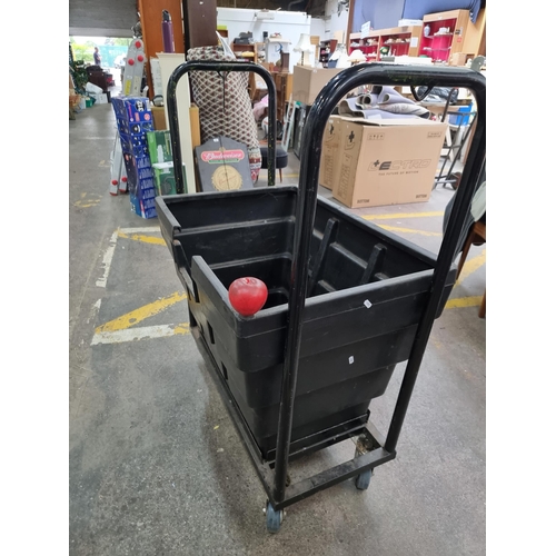 857 - A very large good quality commercial /container held on an industrial trolley with four castors. The... 