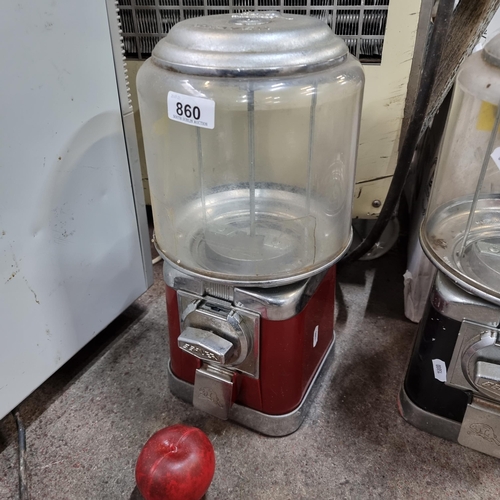 860 - A vintage round Beaver branded gumball / bouncy ball dispenser machine. A coin operated machine in a... 