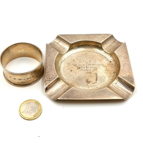 877 - Two silver items, including an ashtray. Hallmarked Birmingham, with a weight of 42.71 grams. Togethe... 