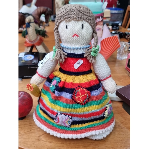 918 - A wonderful handmade knitted woolen reversable doll. One side features a doll with brown plaited hai... 