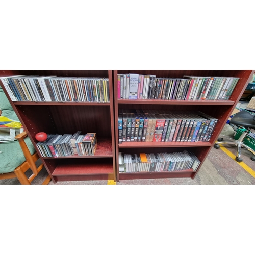 927 - A huge collection of CDs and video tapes including music, audio books and tv series and films. Music... 