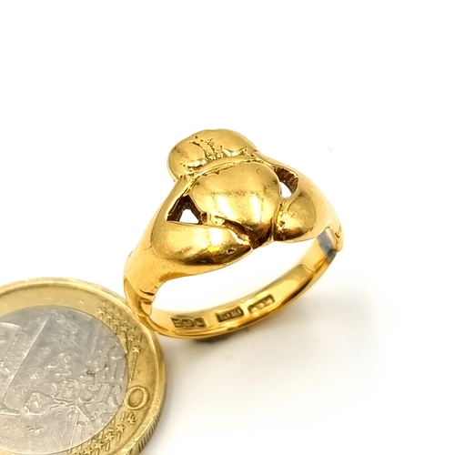 929 - Star Lot : A fabulous and heavy example of a vintage George VI 15 carat gold Claddagh ring. Weight o... 