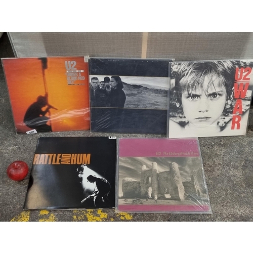 889 - A selection of five original U2 LP vinyl records including albums such as 'The Joshua Tree', the Liv... 