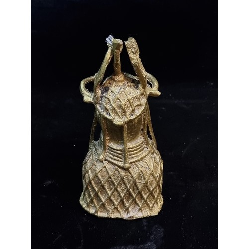 A solid brass bust of the Oba of Benin, the ruler of the Edo people ...