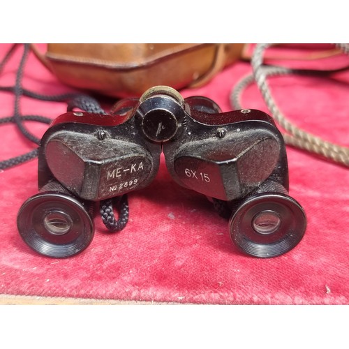 261 - A pair of vintage miniature binoculars from ME-KA with serial No.2899 and 6x15 lenses. Accompanied b... 