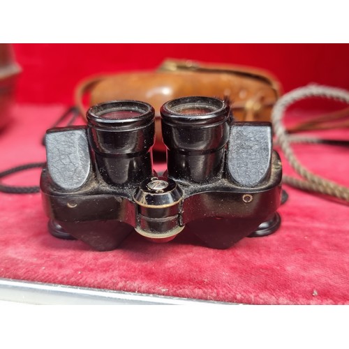 261 - A pair of vintage miniature binoculars from ME-KA with serial No.2899 and 6x15 lenses. Accompanied b... 