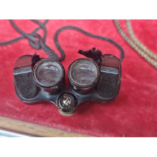 261 - A pair of vintage miniature binoculars from ME-KA with serial No.2899 and 6x15 lenses. Accompanied b... 