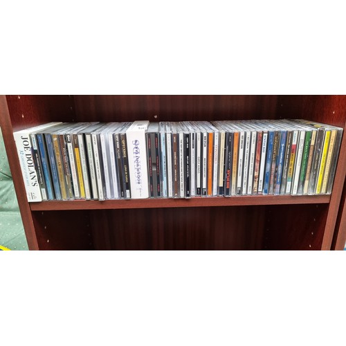 927 - A huge collection of CDs and video tapes including music, audio books and tv series and films. Music... 