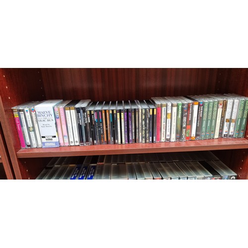 927 - A huge collection of CDs and video tapes including music, audio books and tv series and films. Music... 