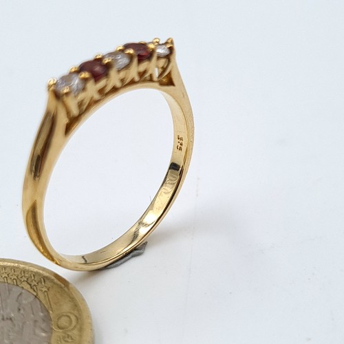 19 - A fabulous 9 carat gold (stamped 375) five stone ruby and moissainte ring. Ring size: P. Weight: 2.0... 