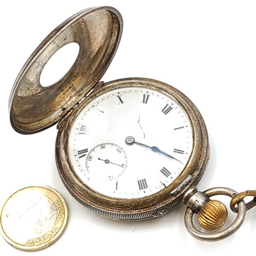 873 - A sterling silver half hunter pocket watch, hallmarked London by A.L.D. Watch number: 48381. This ex... 