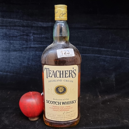 123 - A rare sealed vintage 1.14L bottle of Teacher's Highland Cream Scotch Whisky. Distilled blended and ... 