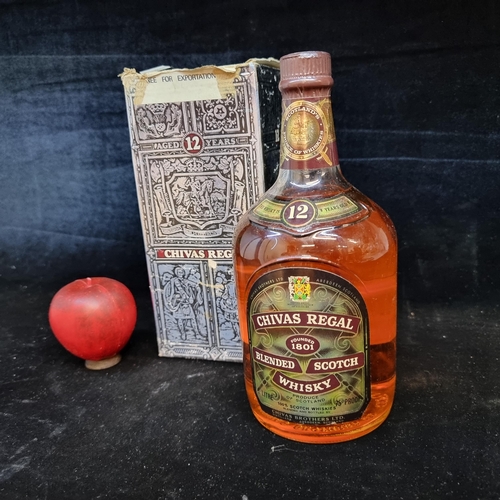 124 - A sealed vintage 1.0L bottle of 12 Years Old Chivas Regal blended scotch whisky. The oldest malt whi... 