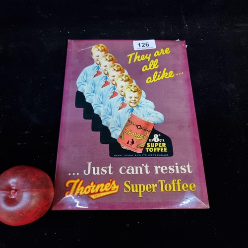 126 - A fabulous vintage advertising celluloid showcard for Thorne's Super Toffee. Depicting a young boy h... 