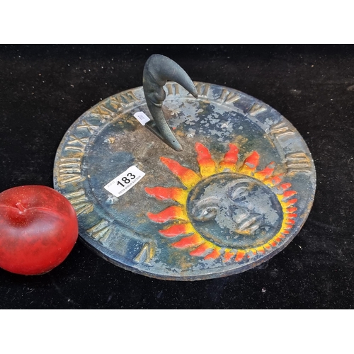 183 - A heavy cast metal sundial in a celestial theme. Featuring a sun to dial and a crescent moon gnomon ... 