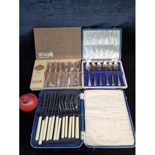 192 - A trio of vintage box EPNS sets. Including a set of six EPNS grapefruit spoons with a set of six But... 