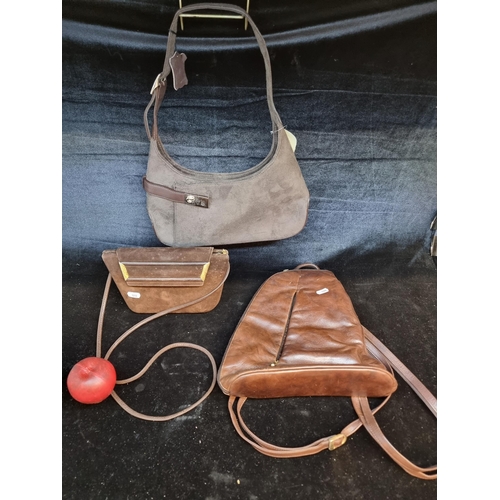 193 - Three vintage genuine leather handbags and purses. Including a Rodo Italian hardcase purse and two g... 