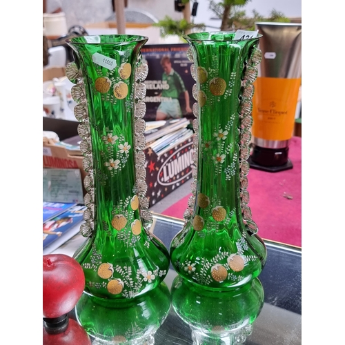 431 - A pair of very charming handblown green glass Victorian vase. A lovely tall example with a hand pain... 