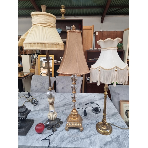 441 - A trio of elegant table lams with brass and diamanté / crystal detailing. All topped with pale gold ... 