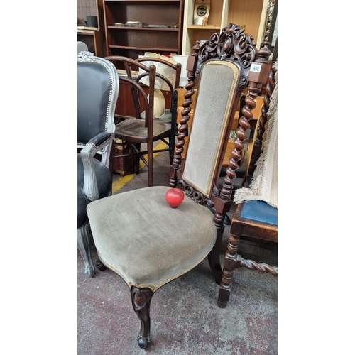 448 - A beautiful Victorian hall chair. A fabulous polished mahogany piece with turned barley twist suppor... 