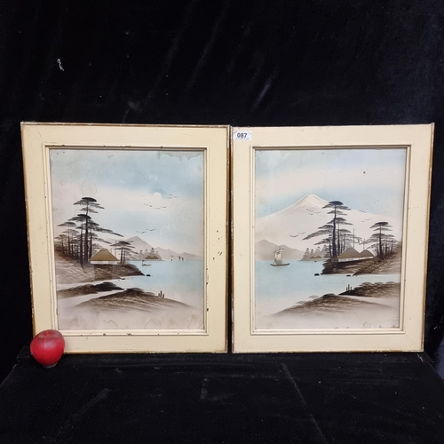 87 - A pair of vintage ink on paper paintings showing an Eastern / Asian landscape setting featuring tall... 