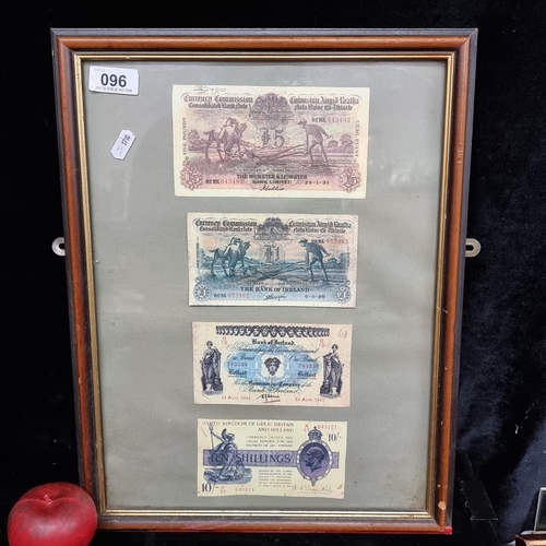 96 - A wood and gilt frame  housing four prints of old Irish pre-decimal bank notes.