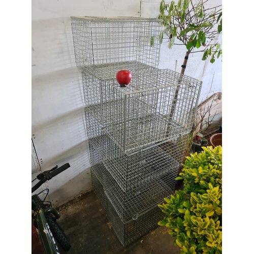 928 - Nine animal cages from Trap Man. H29cm x W47cm x D32xm all in good order.  (9)