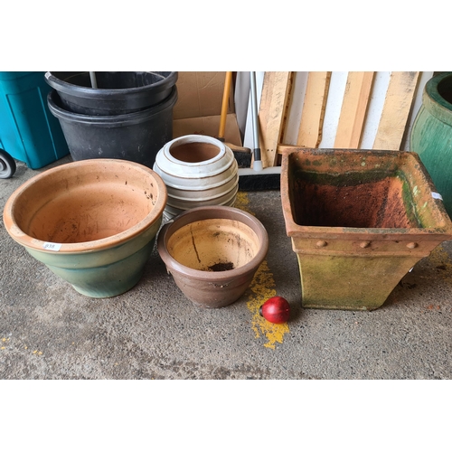 938 - Four ceramic planters with a large square terracotta example, a round planter in a seafoam green gla... 