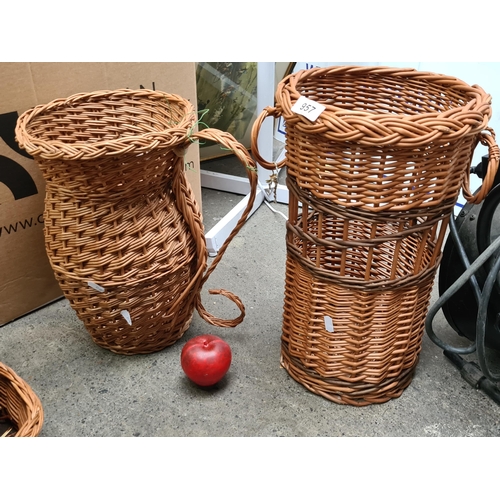 957 - Two new  wicker baskets. Including one unusual cylindrical one with open reveals. New from the wicke... 